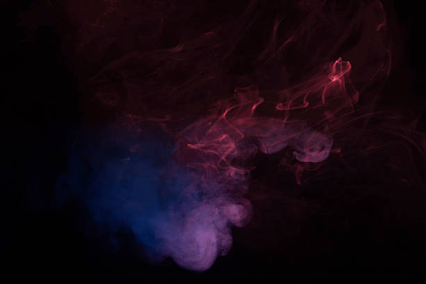 istock Blue and pink steam on a black background. 2211450257