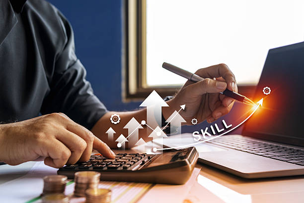 istock Business Skill Development with Laptop and Calculator for Financial Growth 2211450441