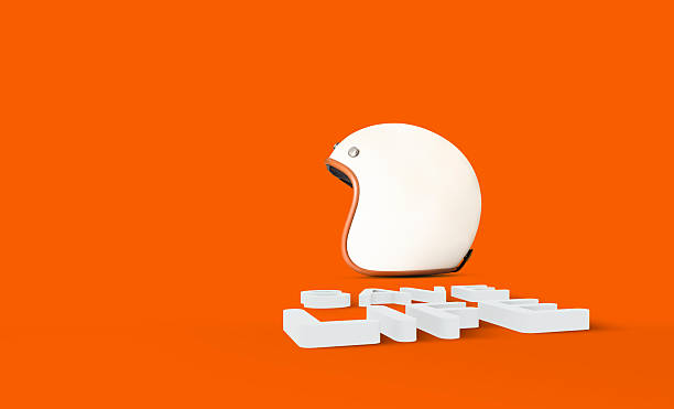 istock Floating Retro Motorcycle Helmet with 3D Safety Typography on Orange Background 2211450452