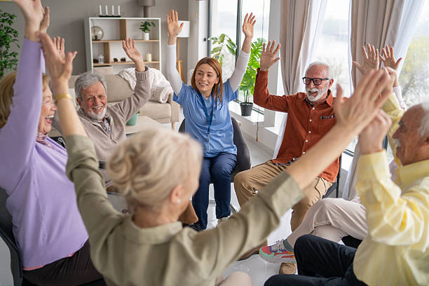Joyful group activity with seniors and caregivers engaged