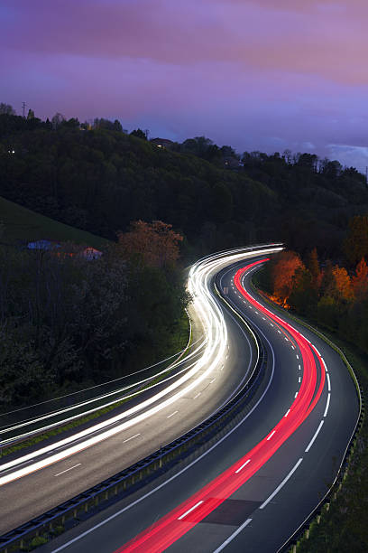 istock In Euskadi, the vehicle's lights glowed brightly as it moved along the highway, creating a dazzling spectacle in the night. 2211453032