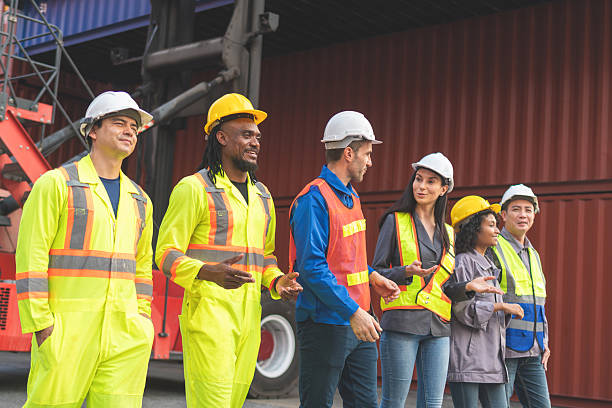 istock Engineer and foreman worker team in industry containers yard, Success teamwork concepts 2211455935