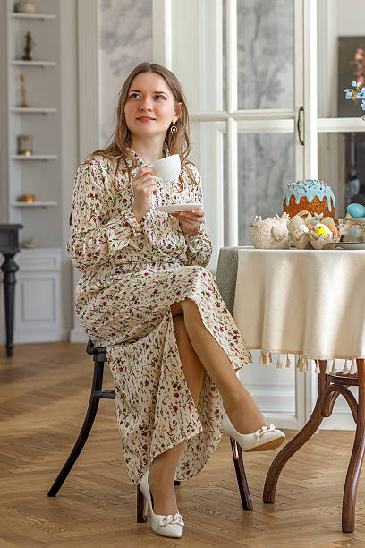 istock Happy Easter. Beautiful blonde woman surrounded by Easter decorations. 2211455982