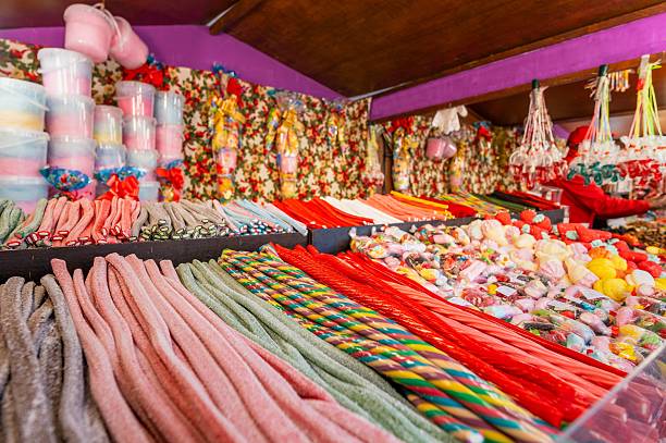 istock Traditional candy stall with colorful sweets in a market. 2211458592