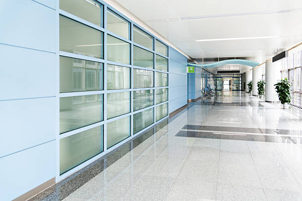 istock Entrance hall with chairs in modern office building 2211458716