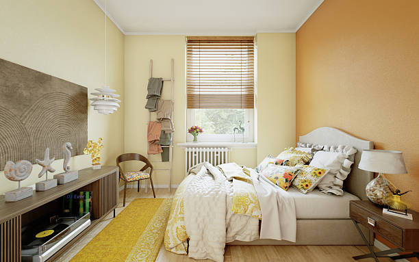 istock Sunlit Yellow Bedroom with Cozy Bedding 2211459626
