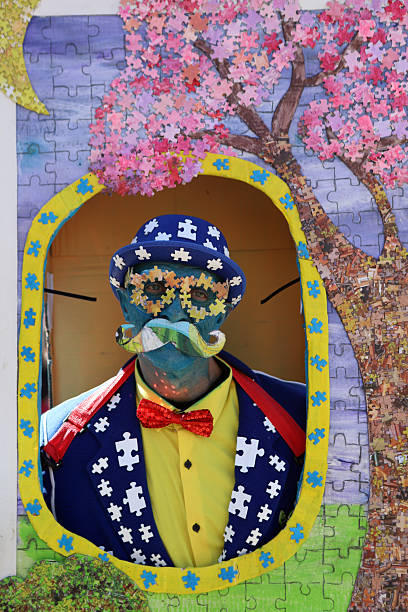 03/02/2025 Venice - Italy\n\nHighly creative outfit seen at the Venice Carnival 2025. All of this persons costume has a puzzle effect - he even built a frame around himself. The amount of creativity & handcraft seen at the Carnival in Venice is just spectacular.