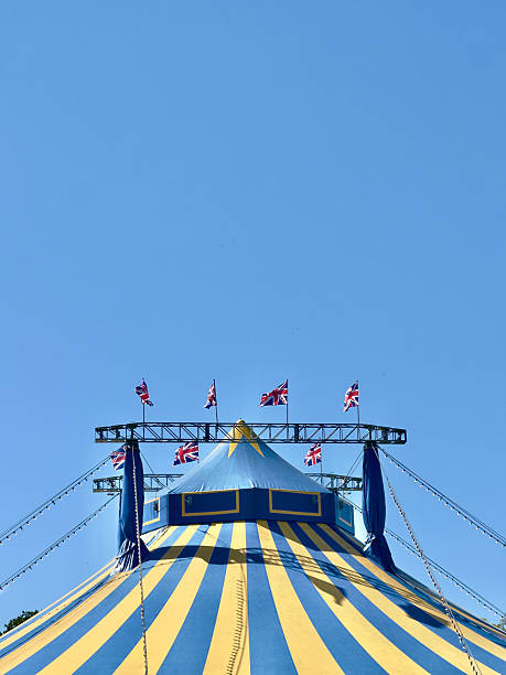 istock A Circus tent Big Top with British Union Jack flags flying on a summers day. 2211465393