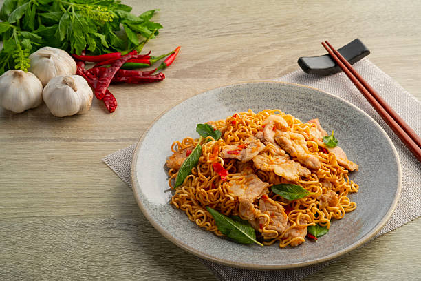 istock Spicy stir fried instant noodle 2211468425