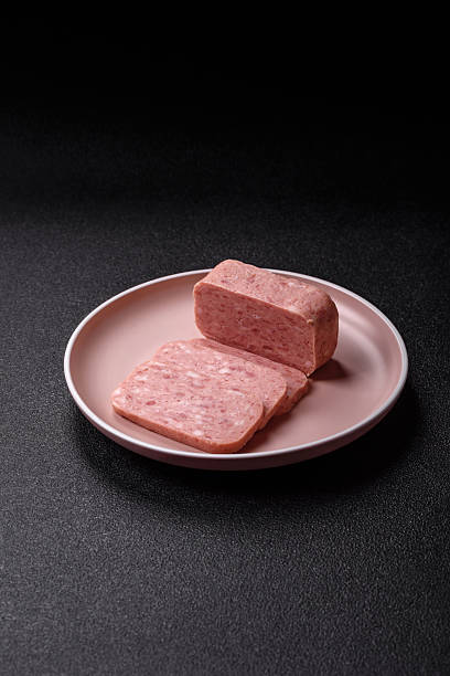 istock Canned ham, meat, pork, with spices and salt 2211469555