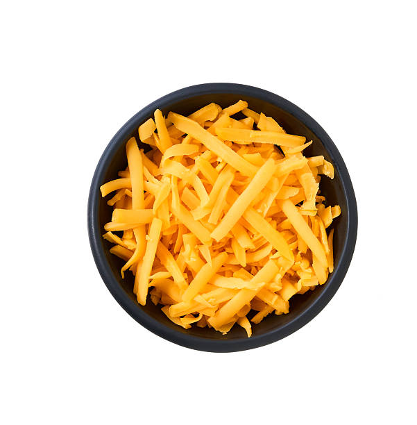 istock black ceramic bowl with grated cheddar cheese isolated on a white background, top view. 2211471427