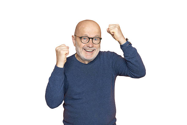 istock A man with his fists raised in victory 2211476245