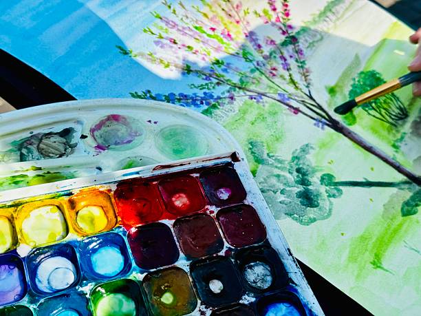 istock Artist painting a Tree with Watercolors 2211476296