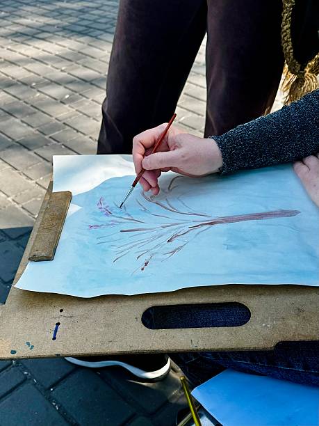 istock Artist painting a Tree with Watercolors 2211476318