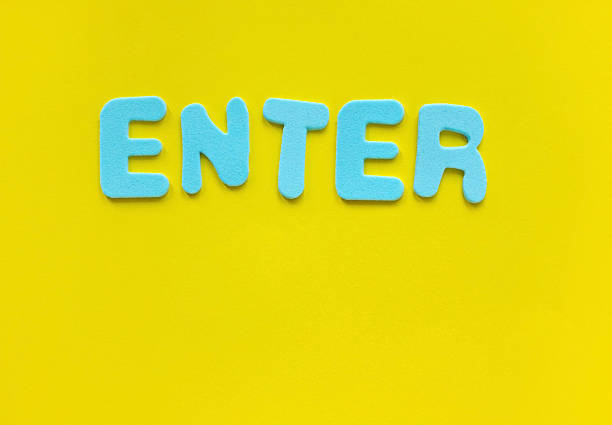 The word Enter message on yellow background. Conceptual enter symbol. Copy space.