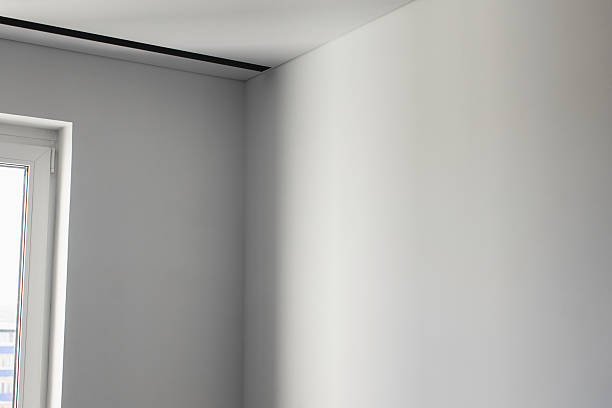 Corner in room. White walls. Loft