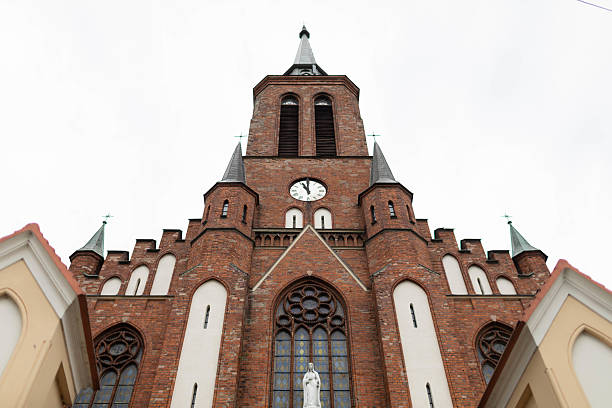 istock Experience the Stunning Gothic Church Architecture featuring a Tower and Beautiful Spires 2211489133
