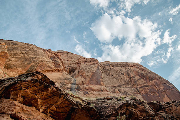 Beautiful  landscape of harsh terrain in Arches National Park in Moab valley, Utah, USA. Over 2000 arches that were formed over 100 million years by a combination of water, ice extreme temperature and underground salt movement.