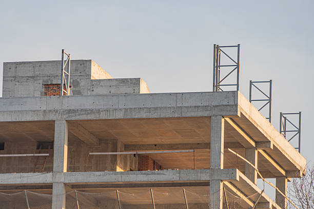 istock A construction site with an early stage multi-story building structure, showcasing growth and progress in a city or community 2211490719