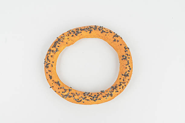 istock Image of a yellow, textured dish possibly containing food or snack against a plain background 2211490882