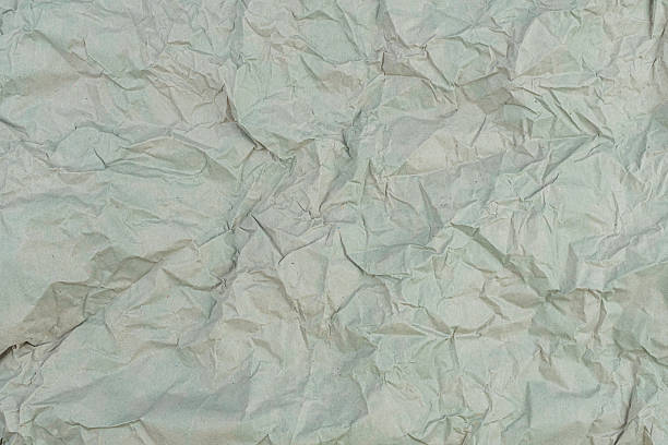 istock Textured background with crumpled paper effect, suitable for graphic design projects 2211490904