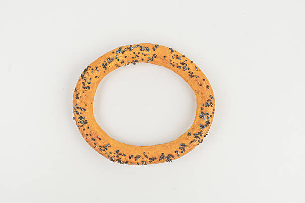 istock This is an intricately designed ring with a textured surface and a wovenbraided central band, giving it a rustic yet crafted look 2211490973