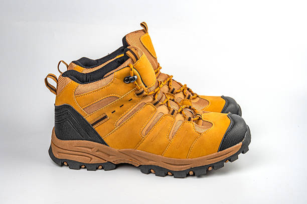 istock Image shows a hiking boot with sturdy construction, good ankle support, and details like a lacing system, reinforced areas, and potentially additional outdoor-friendly materials 2211491107