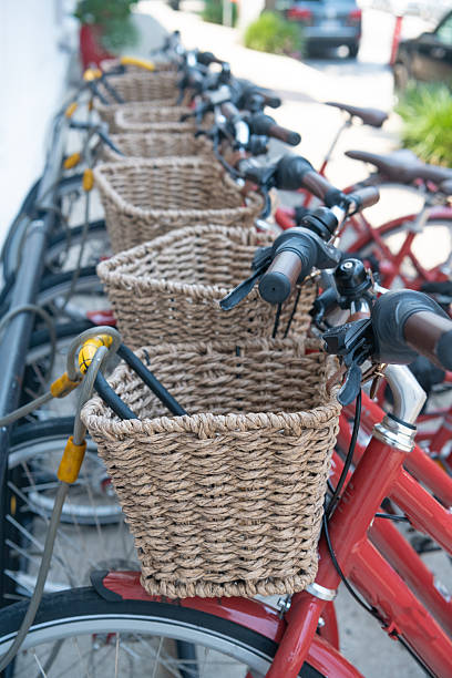 Washington. USA. march 30, 2025  Bicycles with baskets in the parking lot for downtown rentals.