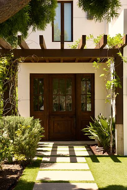 istock Front door with decorative portico 2211506547
