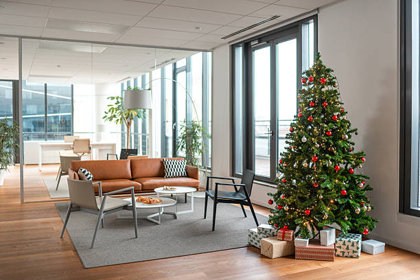 istock Modern Office with Festive Christmas Tree and Gifts 2211507390