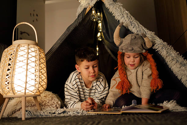 istock Sibling Bonding Time in a Cozy Blanket Fort 2211508057