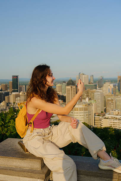 istock Woman using smartphone in Montreal, Canada 2211510053