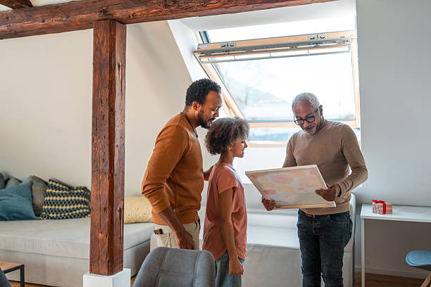 istock Multiethnic Family Exploring Map Together Indoors 2211519333