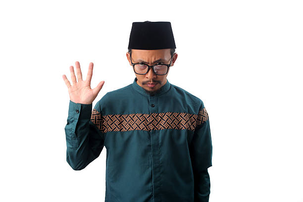 istock Angry Asian Muslim Man Showing Number Five Gesture 2211526180