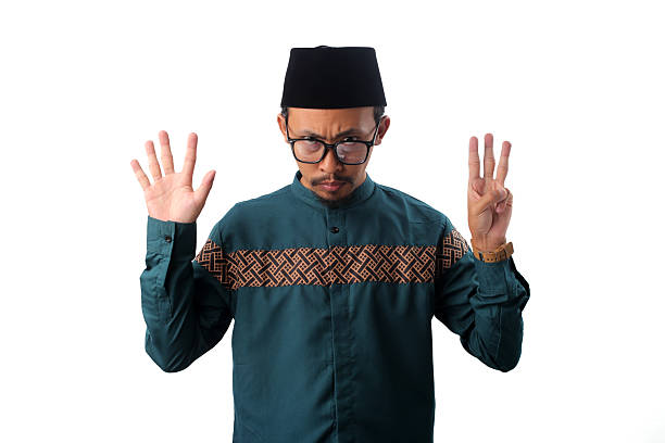 istock Angry Asian Muslim Man Showing Number Eight Gesture 2211526184