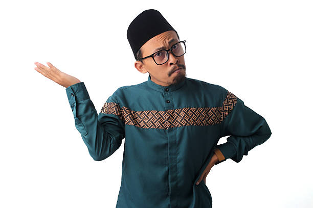 istock Confused and Annoyed Asian Muslim Man Asking 'What's the Problem?' 2211526737