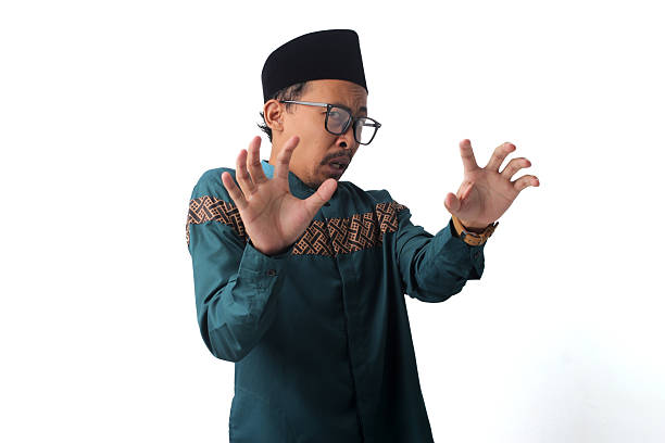 istock Disgusted Asian Muslim Man Rejecting Temptations While Fasting During Ramadan 2211526775