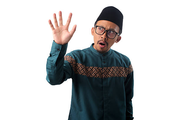 istock Surprised Asian Muslim Man Showing Number Five Gesture 2211527648