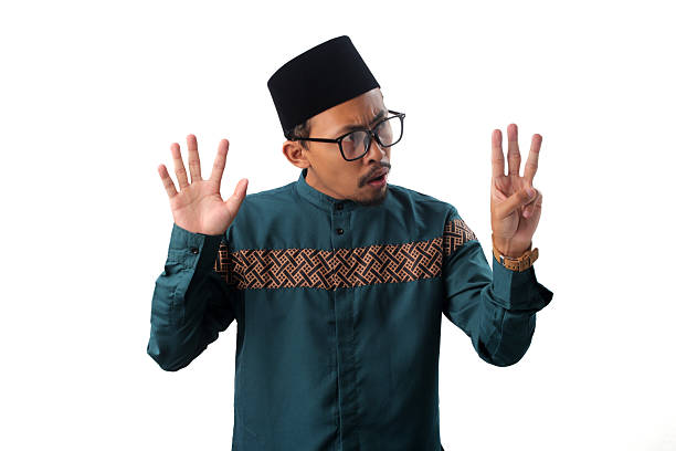 istock Surprised Asian Muslim Man Showing Number Eight Gesture 2211527653