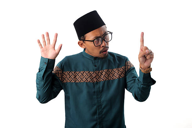 istock Surprised Asian Muslim Man Showing Number Six Gesture 2211527666