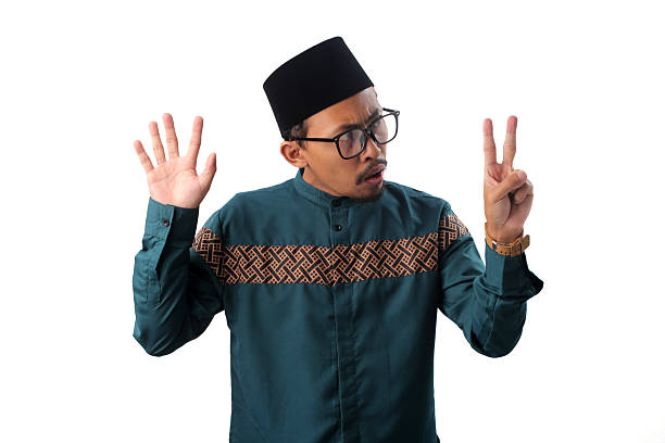 istock Surprised Asian Muslim Man Showing Number Seven Gesture 2211527682