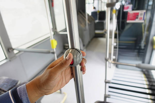 istock A passengers perspective while holding a metal pole on a city bus during the ride 2211528257