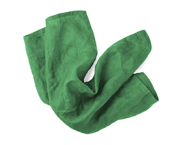 istock Green linen napkin cloth isolated on white background 2211528478