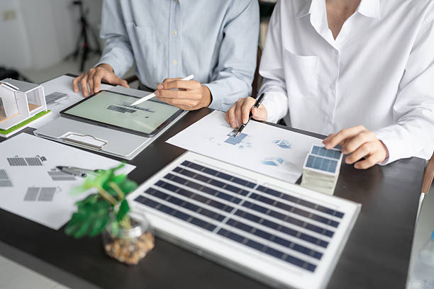 istock Solar panels green energy Business man working green eco friendly office business creative idea Planing Bio economy for business eco friendly professional Engineer sustainable electricity. 2211528708