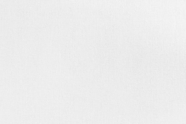 istock White cotton fabric texture background, seamless pattern of natural textile. 2211529912