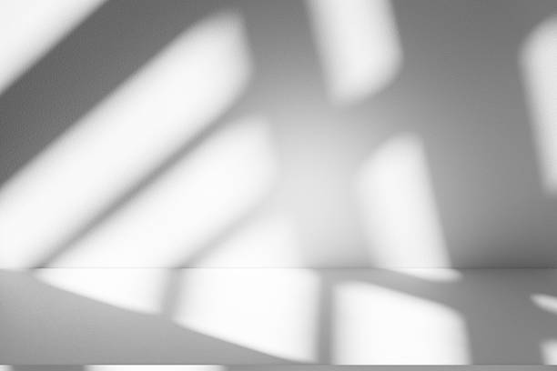 istock Wall interior background, studio and backdrops show products.with shadow from window color white . background for text insertion and presentation product 2211532482