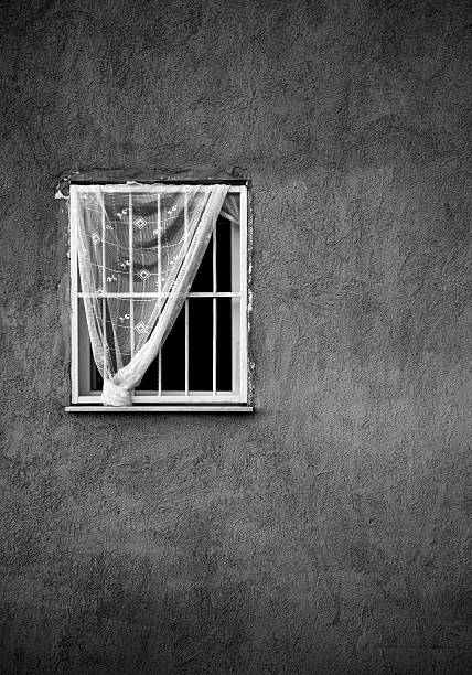 An old window and curtain from an old house