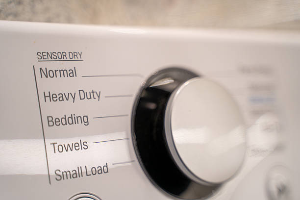Close up of dryer control buttons.