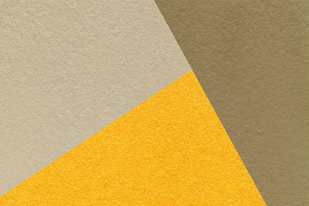 istock Texture craft yellow, beige and brown shade paper background, macro. Structure vintage sand abstract cardboard 2211534138