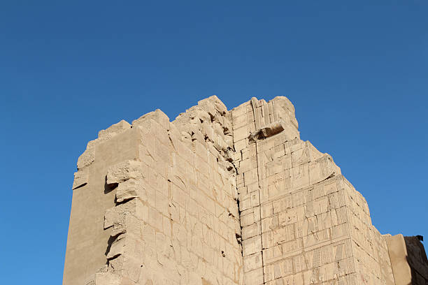 istock Relief on the wall at the second pylon of Karnak Temple Complex 2211536369